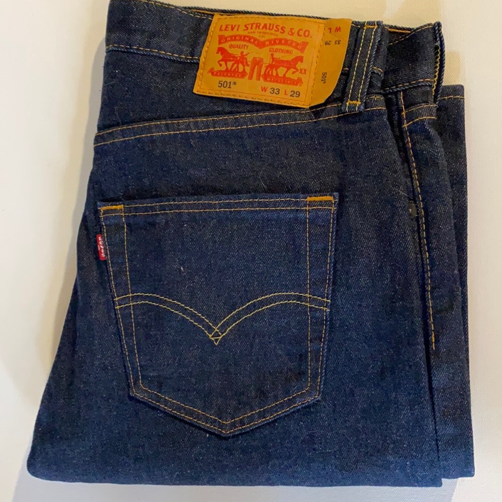 Levi’s 501 button fly NWOT 33x29 dark blue jeans